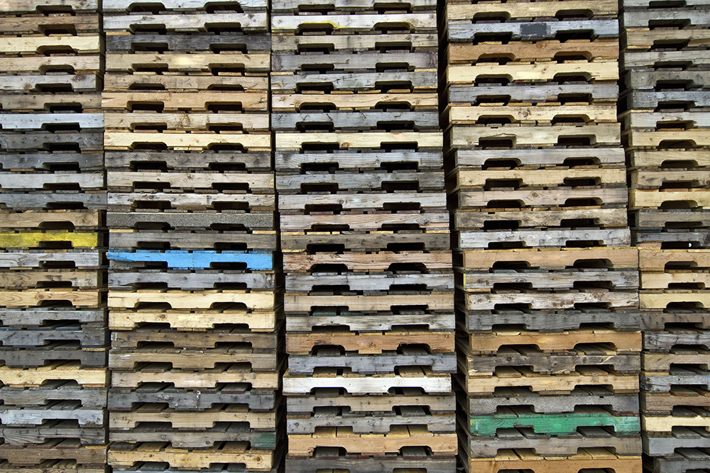 Stack of 48x40 wood pallets available for sale throughout continental US