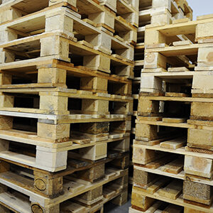 Stack of remanufactured pallets in a warehouse in Tampa Florida